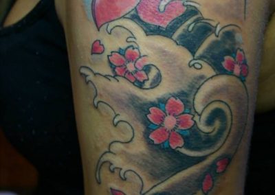 shop negozio piercing tatuaggio giapponese loto colore fiori pesco ciliegio