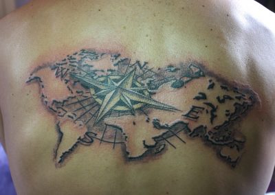 tatuaggio schiena mondo super top via Goito 10a