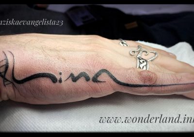 best tattoo bologna wonderland.ink